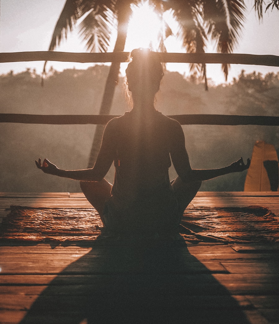 Person resting quietly in a calm, meditative posture — space for the mind to settle.